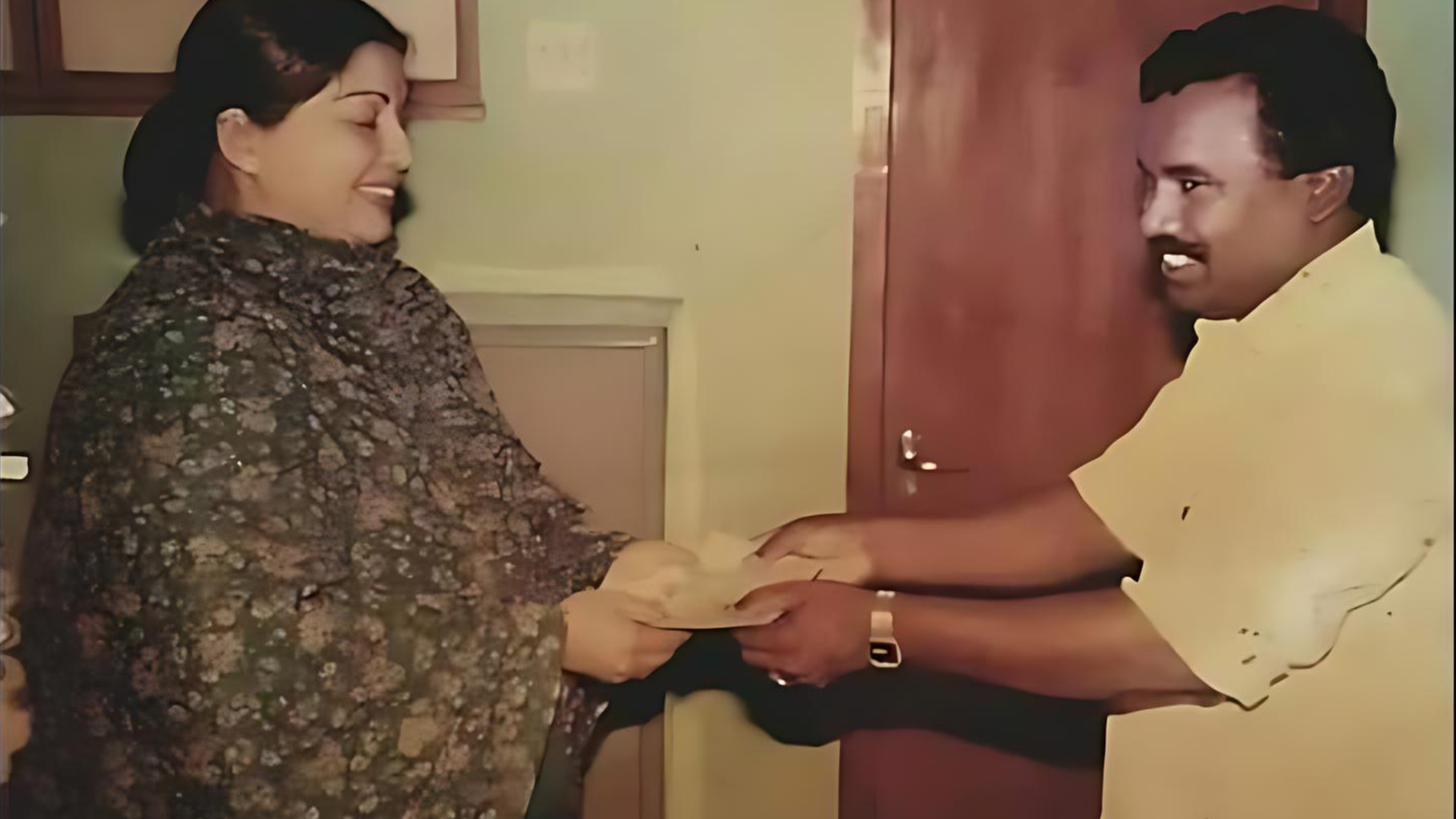 A Moment of Connection: Honourable Amma with Dr. M. Dhanapal – 2001